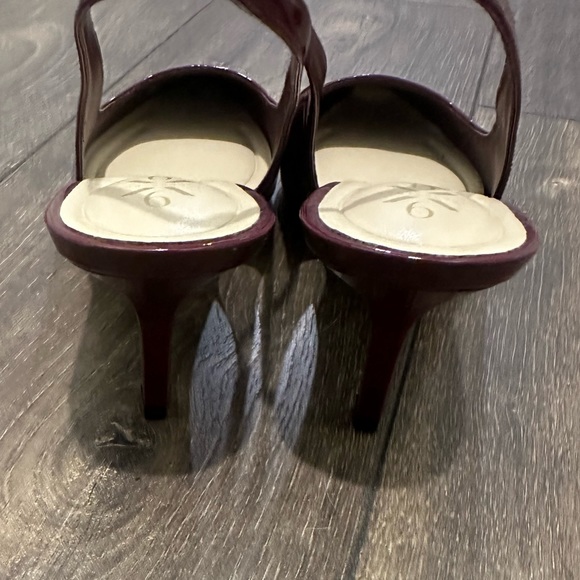 Nine West NWOT Kately 9x9 Slingback Pumps
PLUM PATENT Size  7.5 - Picture 8 of 10